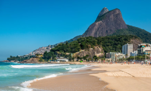 Leblon Beach in Rio de Janerio with moutain and ocean views
